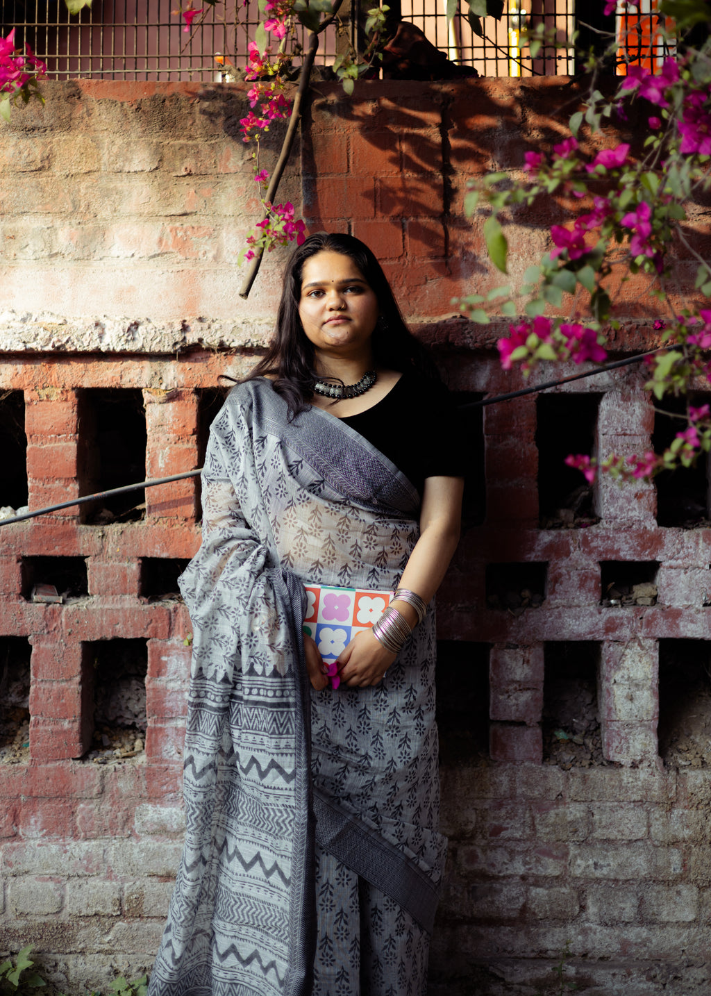 Cement Grey Kota doria Saree with black Motifs and tassle Pallu